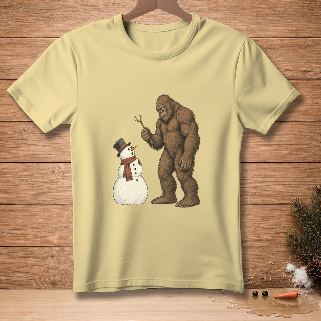 Bigfoot holding a stick near a snowman with a top hat and scarf.