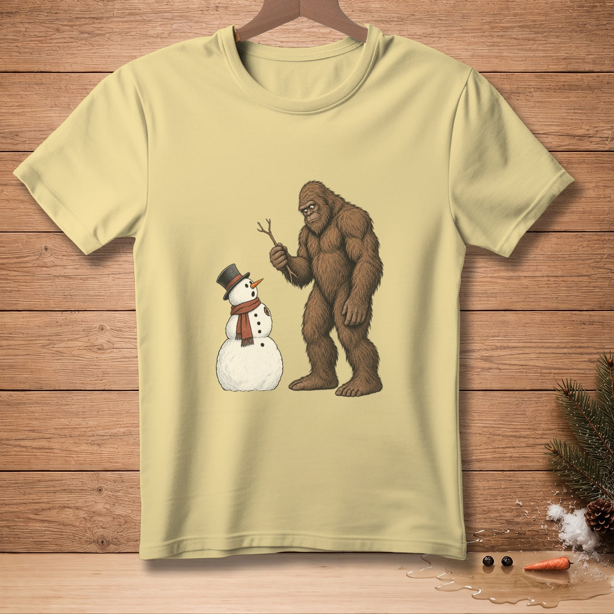 Bigfoot holding a stick near a snowman with a top hat and scarf.