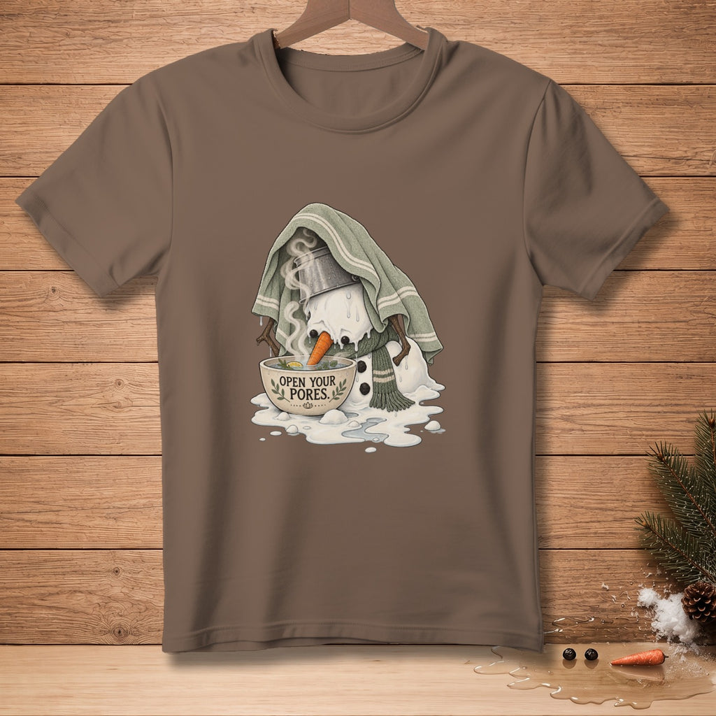 Snowman with a towel over its head steaming in a bowl with carrots.