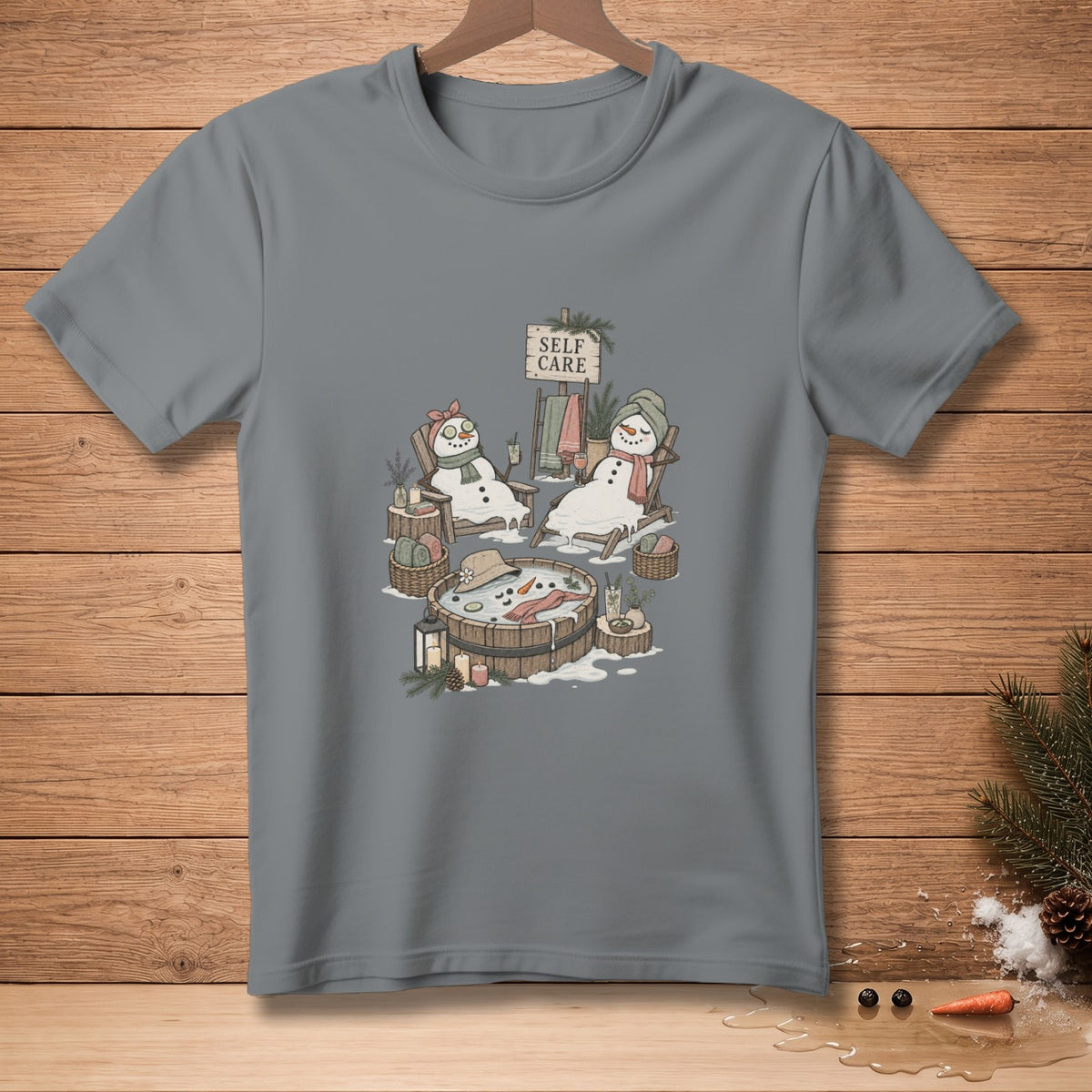 Snowmen relaxing in a hot tub with a "Self Care" sign on a grey t-shirt.