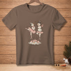 Two snowmen in ballet tutus dance on a brown t-shirt with "Swan Lake" text.