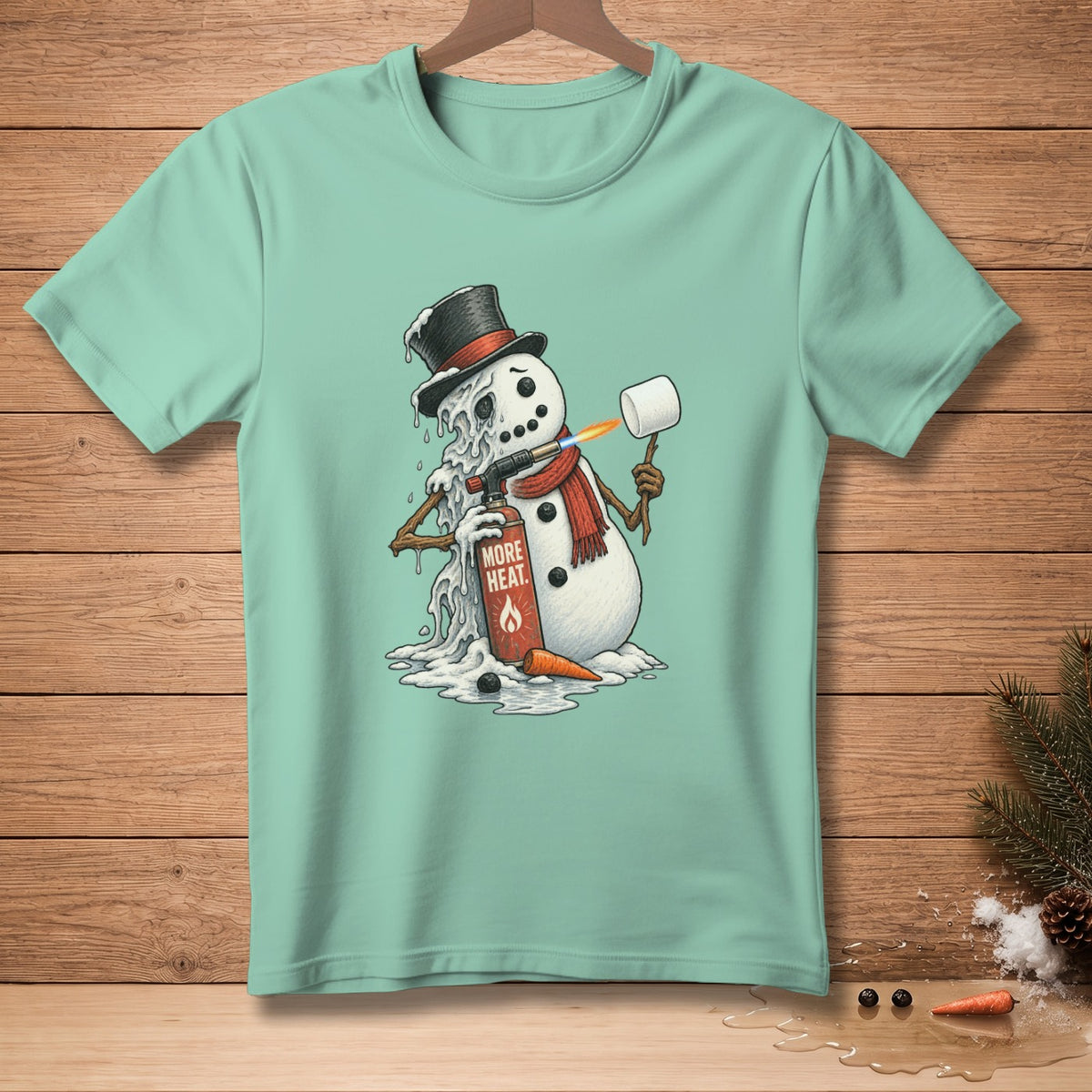 Snowman melting with a torch and marshmallow, on a teal t-shirt.