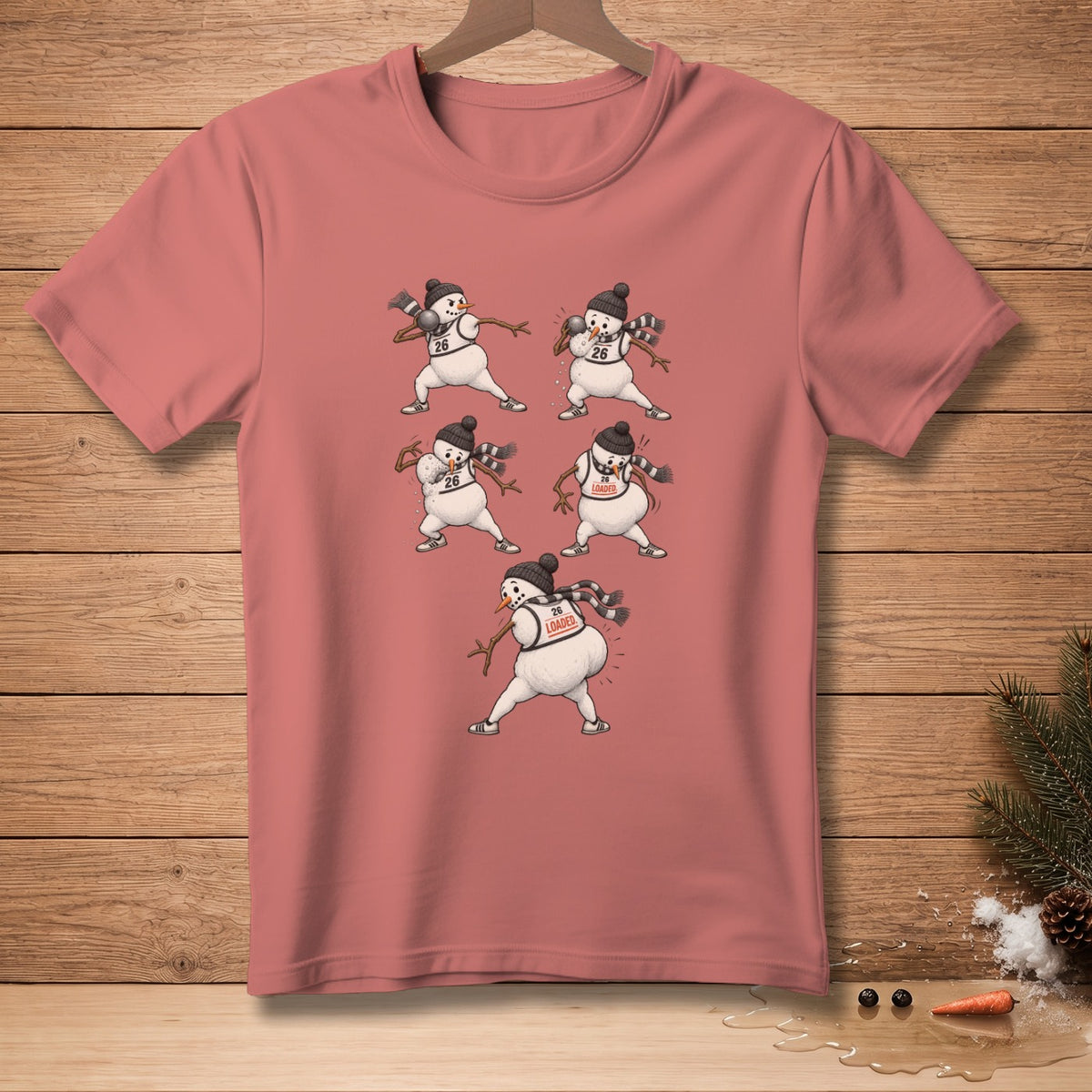 T-shirt with multiple snowmen lifting weights, some with "26" or "LOADED" on their vests.