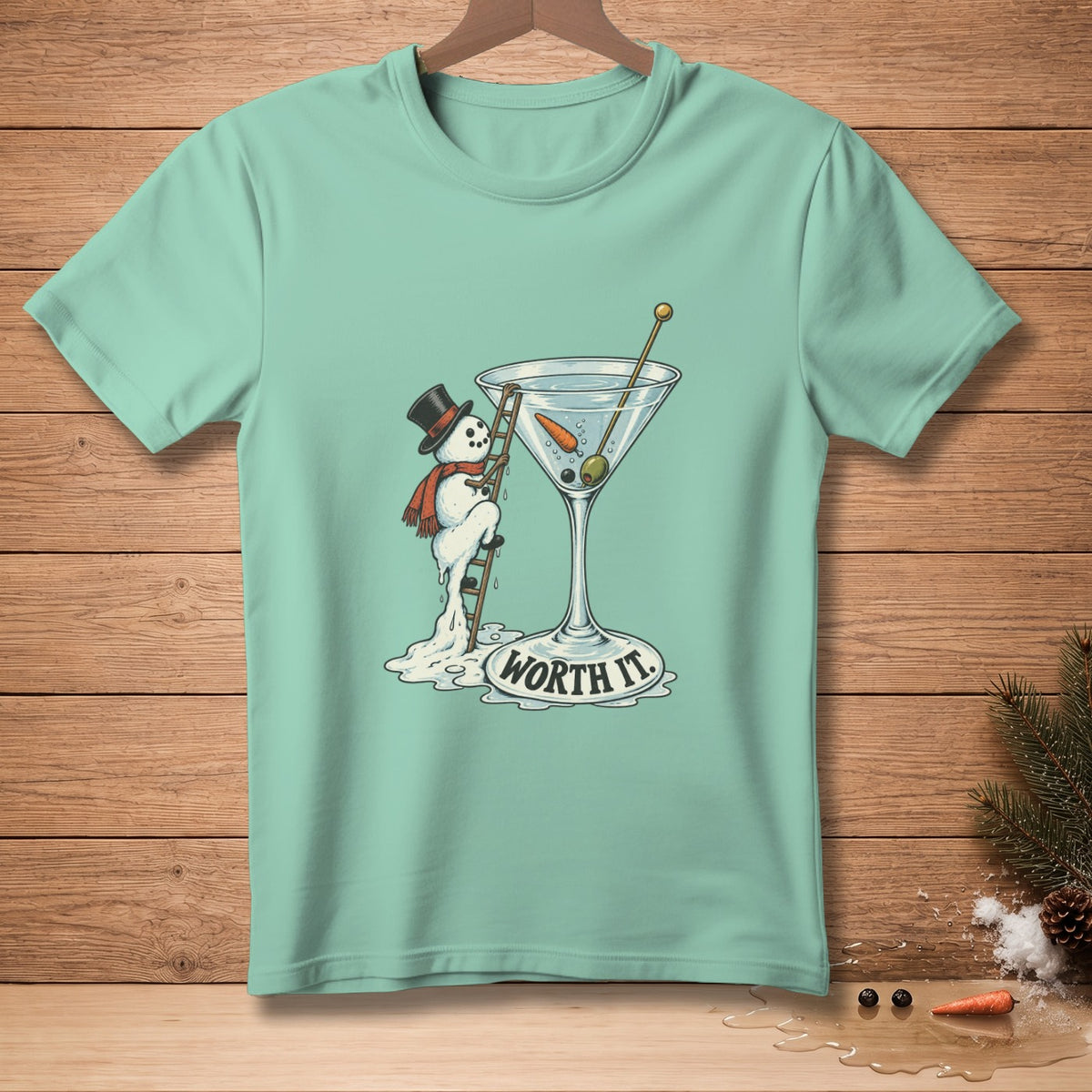Snowman climbing a ladder into a martini glass with text "Worth It."