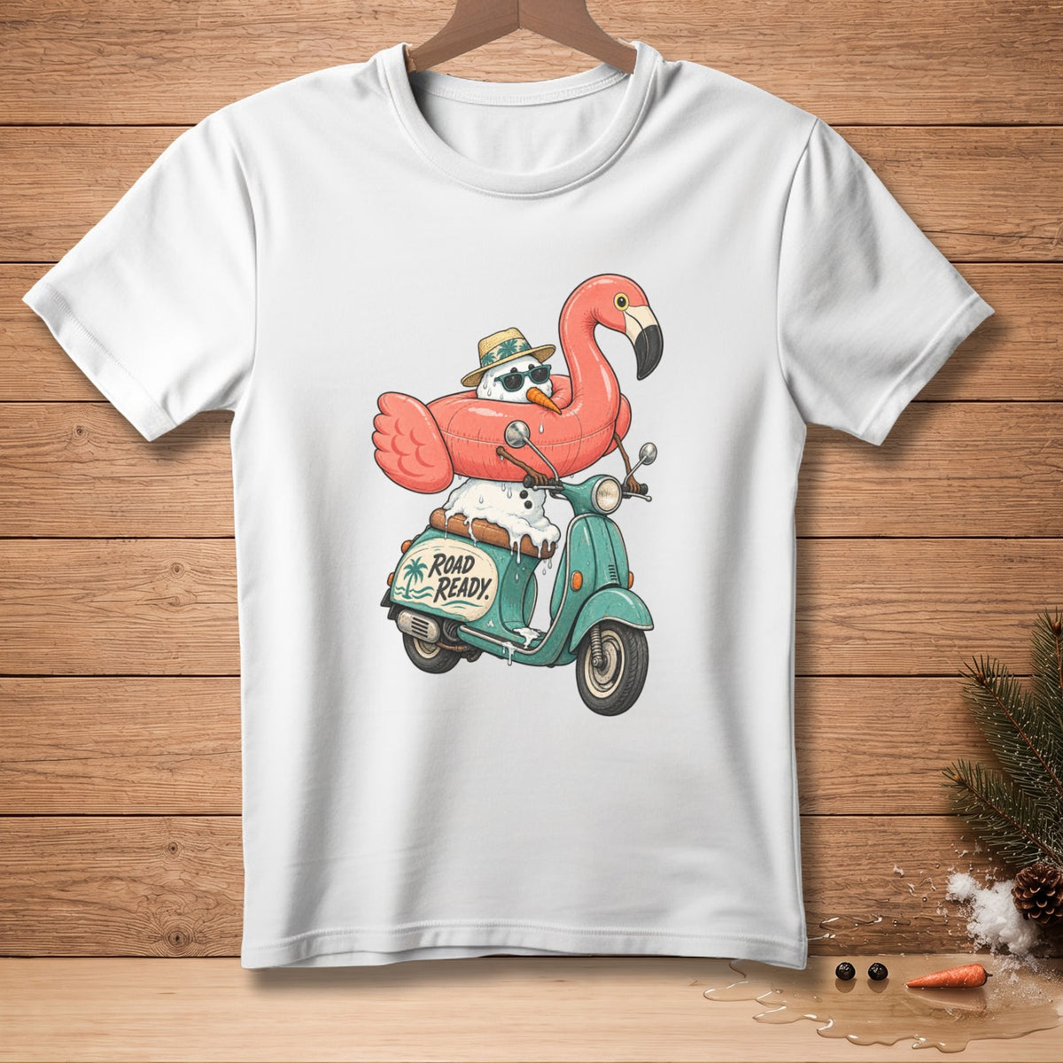Snowman with flamingo float on scooter, text "Road Ready".
