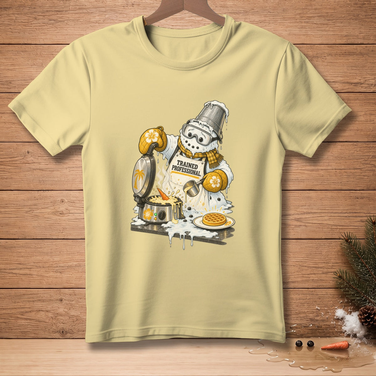 Snowman wearing a bucket hat and apron making waffles, text "Trained Professional".