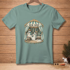 T-shirt graphic of two melting snowmen in sunglasses relaxing under a thatched-roof cabana with "OUR SPOT" text.