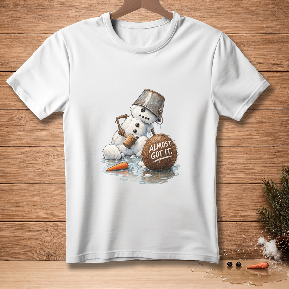 T-shirt with melting snowman, bucket hat, and coconut that reads "ALMOST GOT IT."
