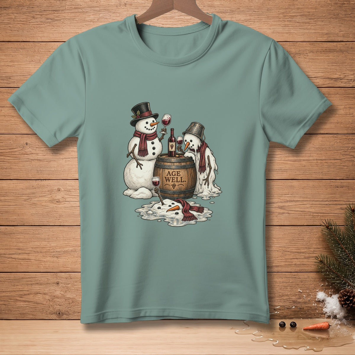 Two snowmen with wine glasses stand by a barrel labeled "AGE WELL."