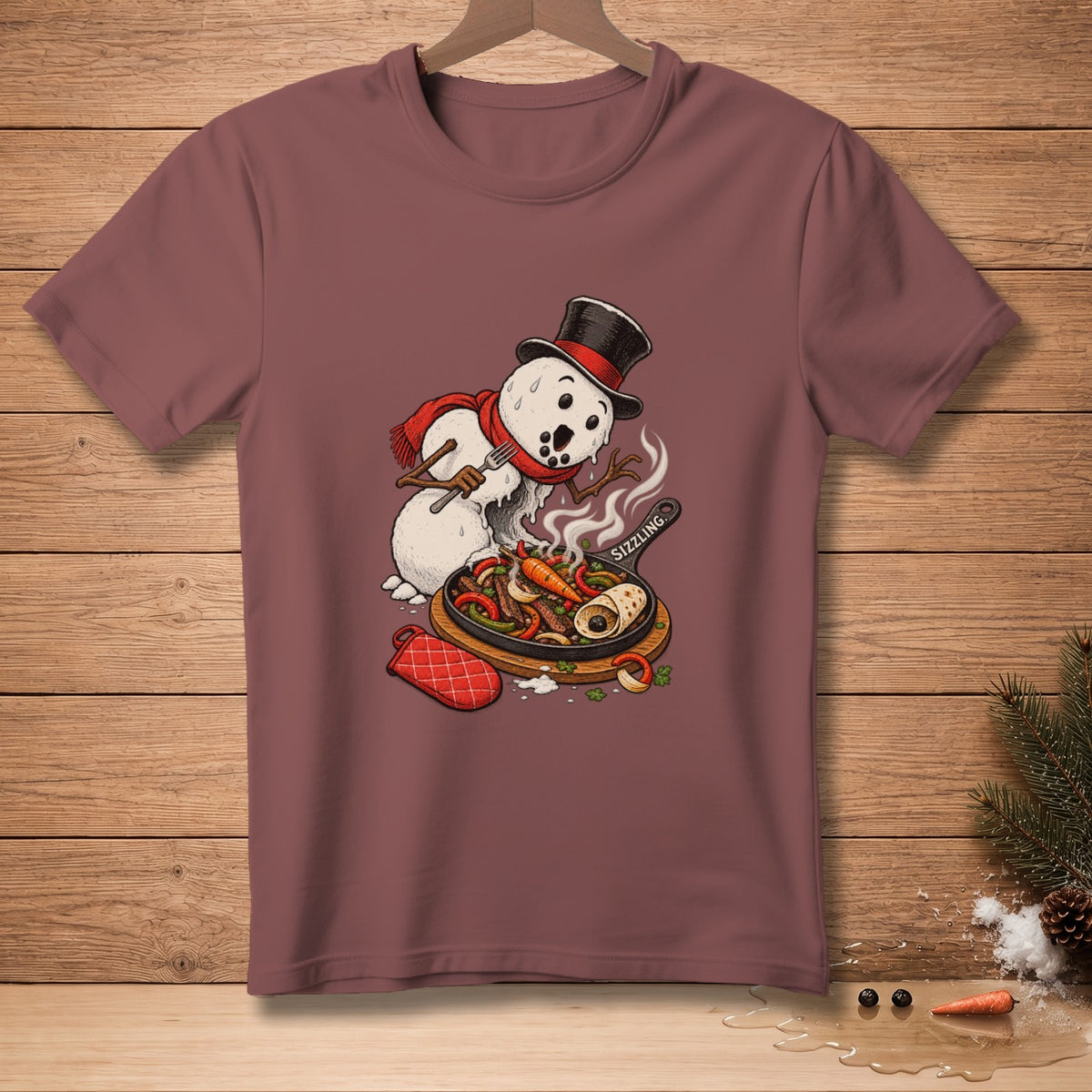 Snowman in a top hat cooks fajitas in a skillet with "Sizzling" text.