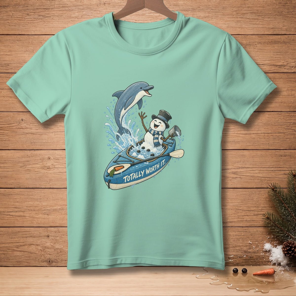 Snowman in a kayak with a dolphin, text reads "Totally Worth It".