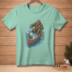 Bigfoot in a canoe pouring water on a melting snowman.