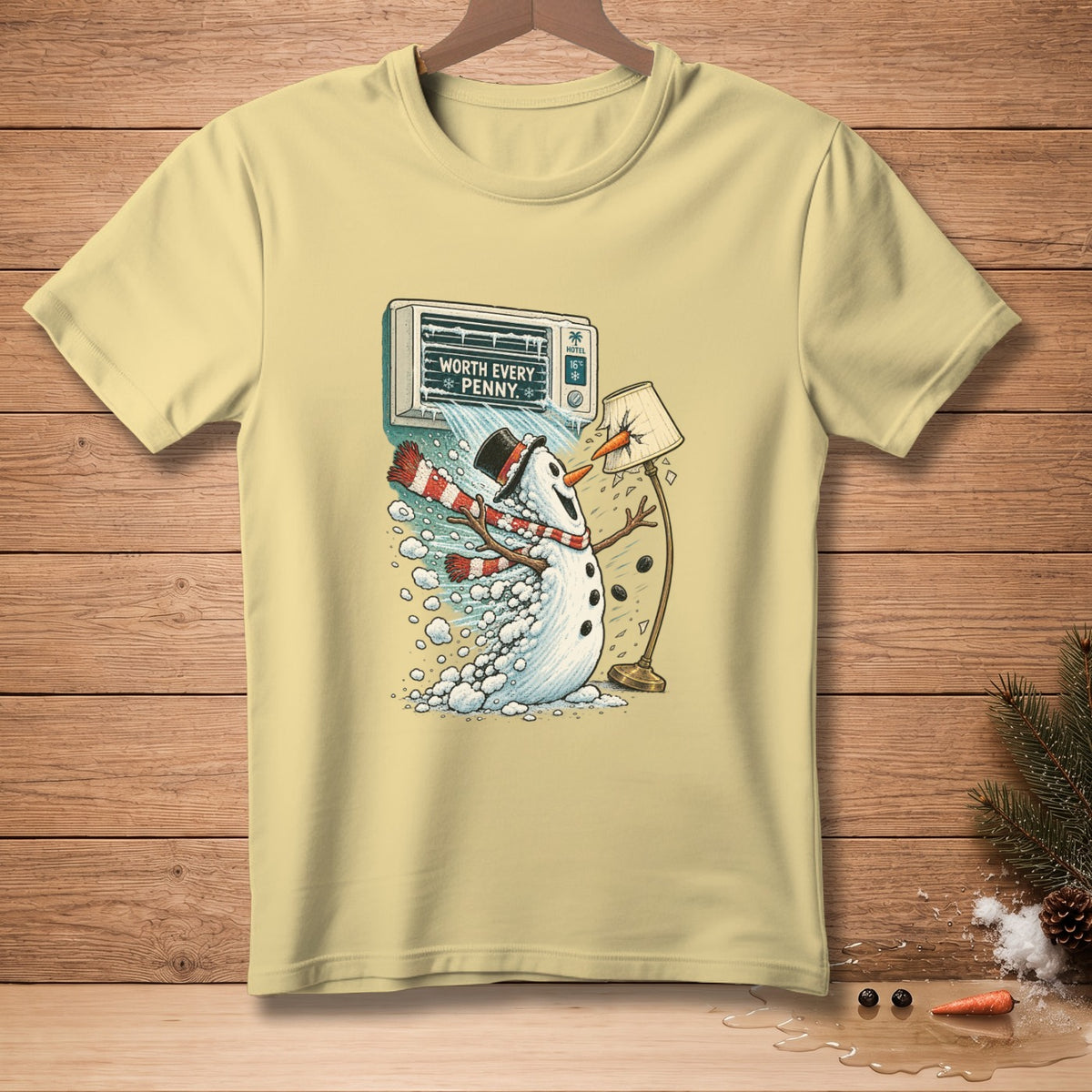 Yellow t-shirt with a snowman graphic and text "WORTH EVERY PENNY."