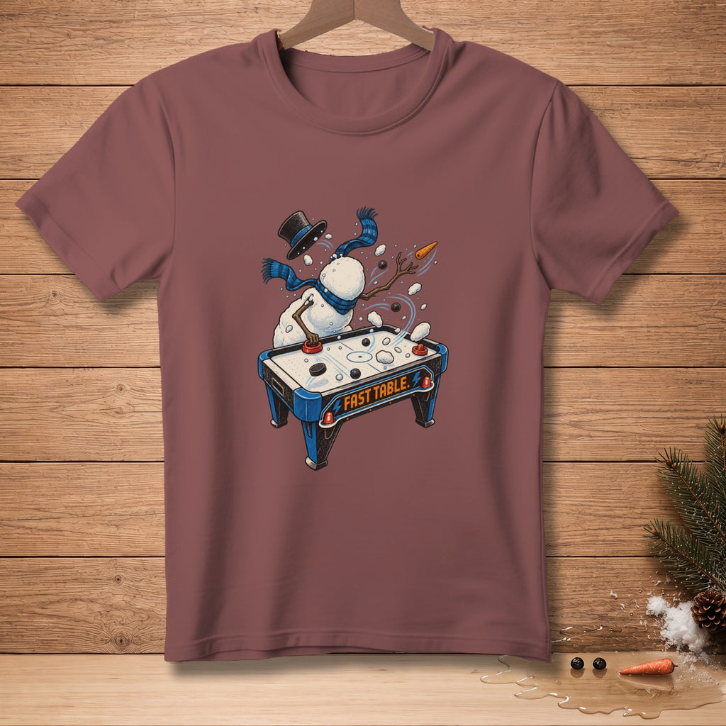 Snowman playing air hockey, wearing a top hat and scarf, with "Fast Table" text.