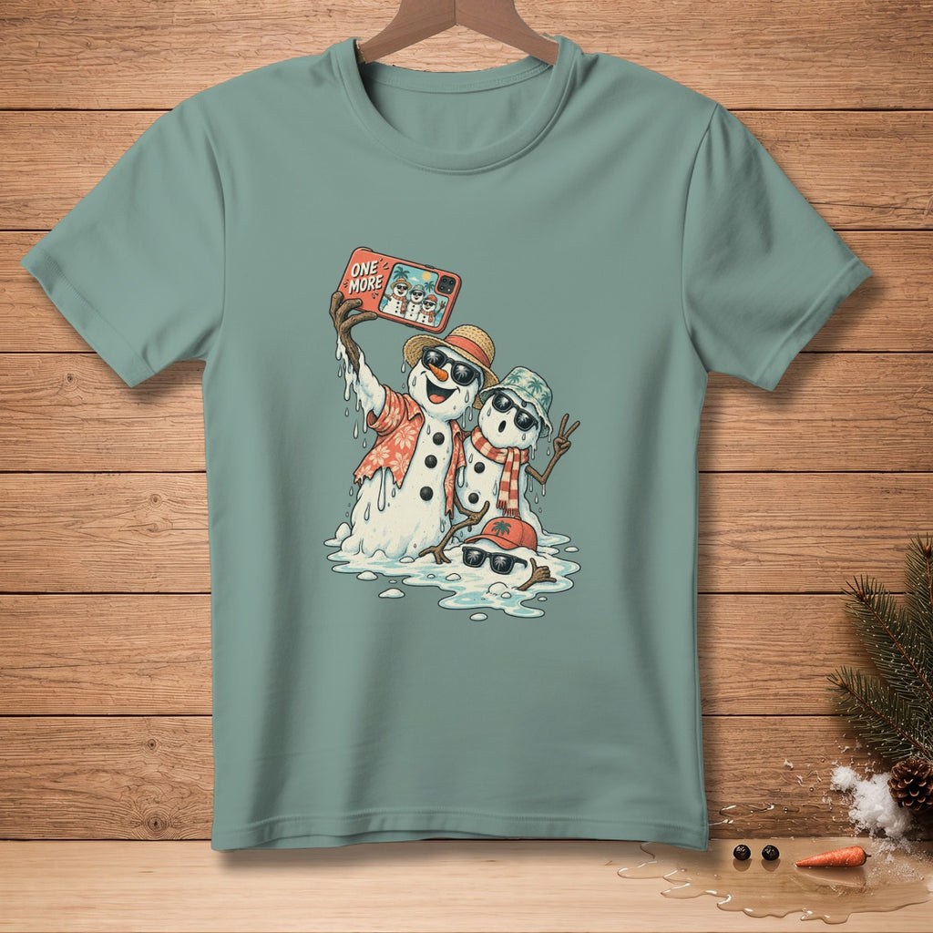 Melting snowmen taking a selfie with text "ONE MORE" on the phone.