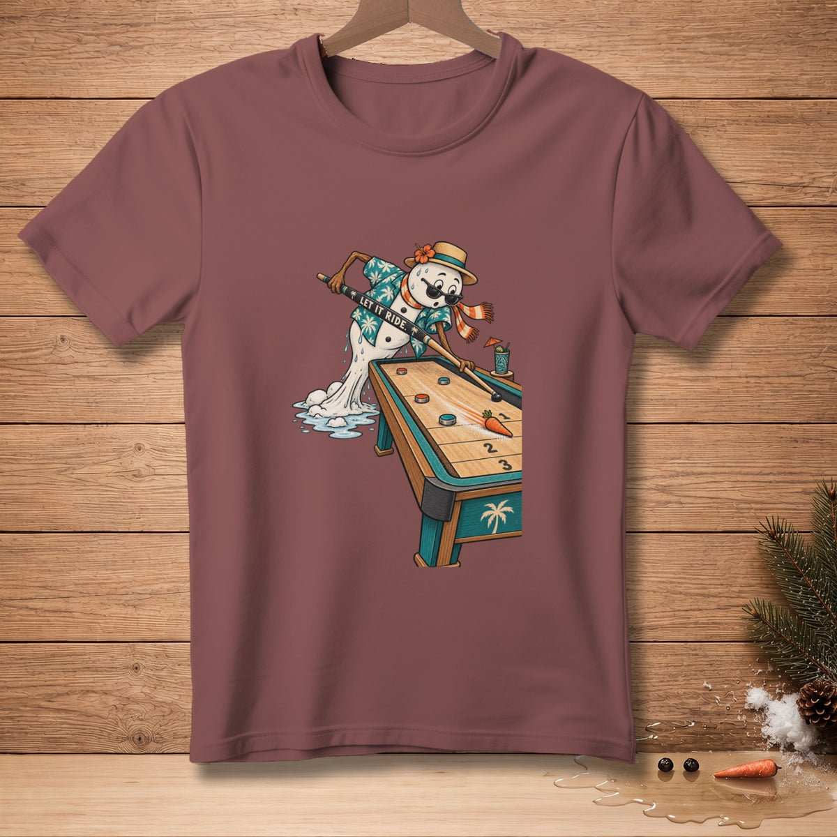 Snowman playing billiards on a tropical table, "LET IT RIDE." text.