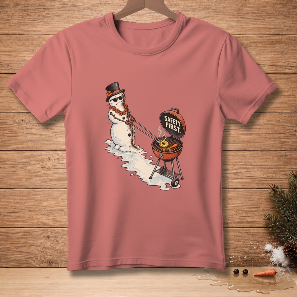 Snowman with top hat, sunglasses, and lei grilling with text "SAFETY FIRST."