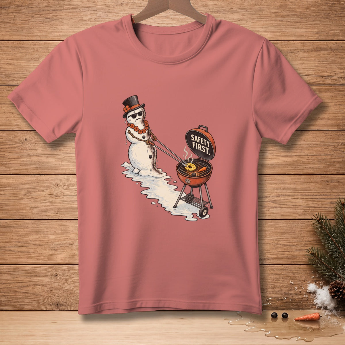 Snowman with top hat, sunglasses, and lei grilling with text "SAFETY FIRST."