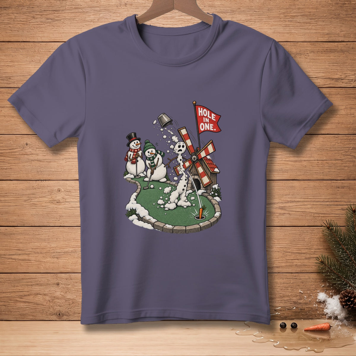 Snowmen play miniature golf near a windmill, with a flag reading "Hole in One."