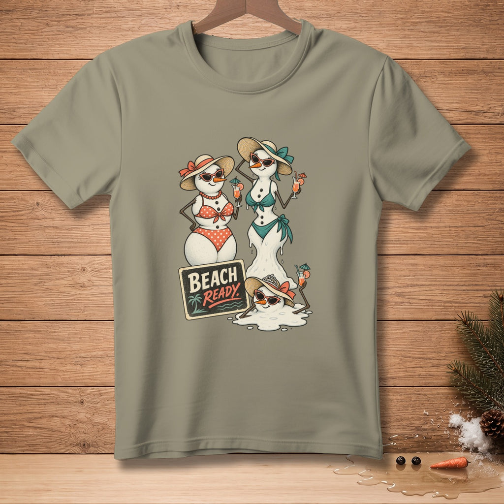 Three snowmen in beach attire stand near a melting snowman and a "Beach Ready" sign.
