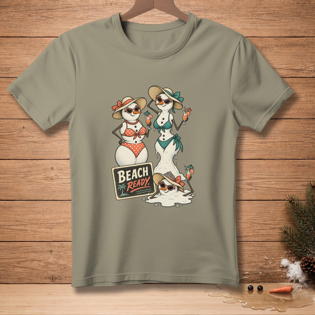 Three snowmen in beach attire stand near a melting snowman and a "Beach Ready" sign.
