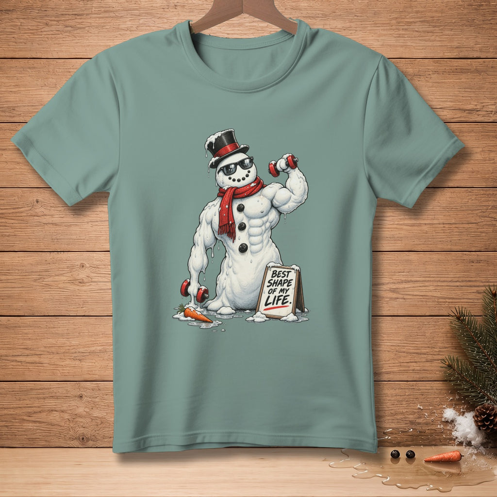 Muscular snowman in top hat and scarf lifts dumbbells next to "Best Shape of My Life" sign.