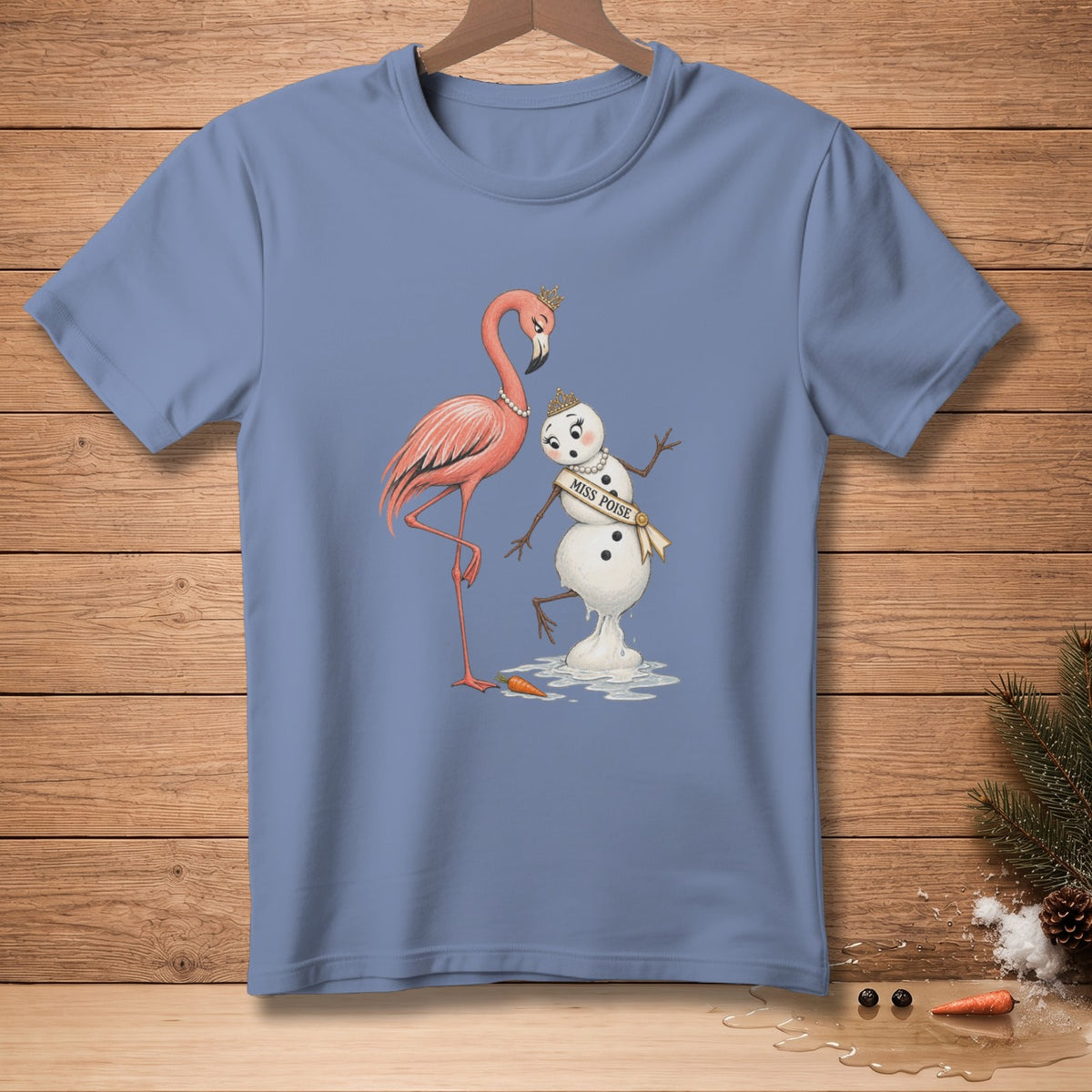 T-shirt with illustration of a flamingo next to a melting snowman with "Miss Poise" sash.