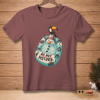 T-shirt with a toucan on a beach snowman with "DO NOT DISTURB" text.