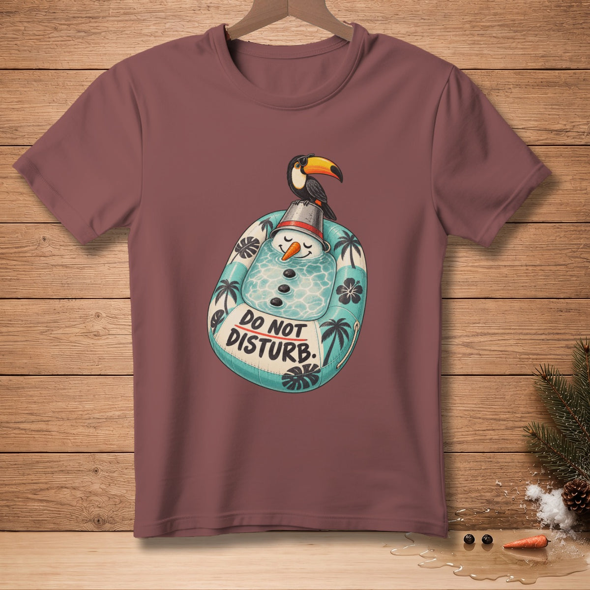 T-shirt with a toucan on a beach snowman with "DO NOT DISTURB" text.
