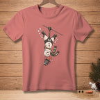 Pink t-shirt with a graphic of a snowman ziplining upside down.
