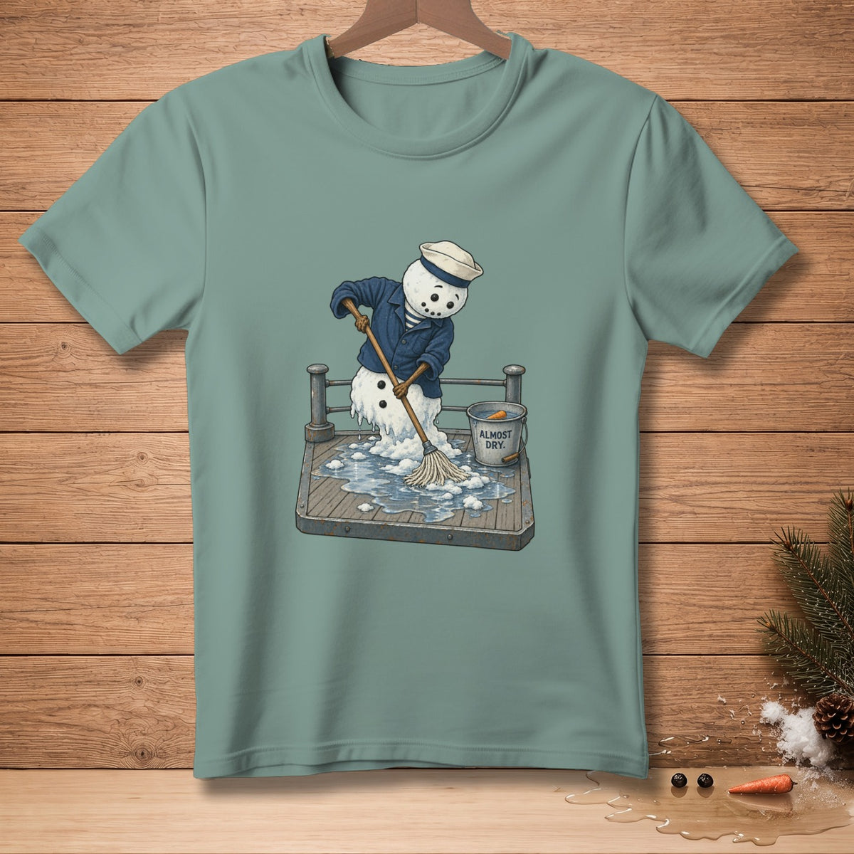 Melting snowman in sailor outfit mopping a deck, with bucket labeled "ALMOST DRY".