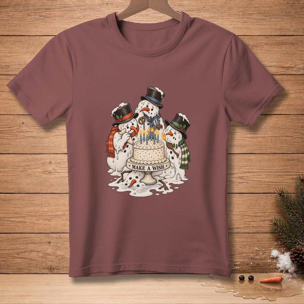 Three melting snowmen gather around a cake with candles, text reads "MAKE A WISH."