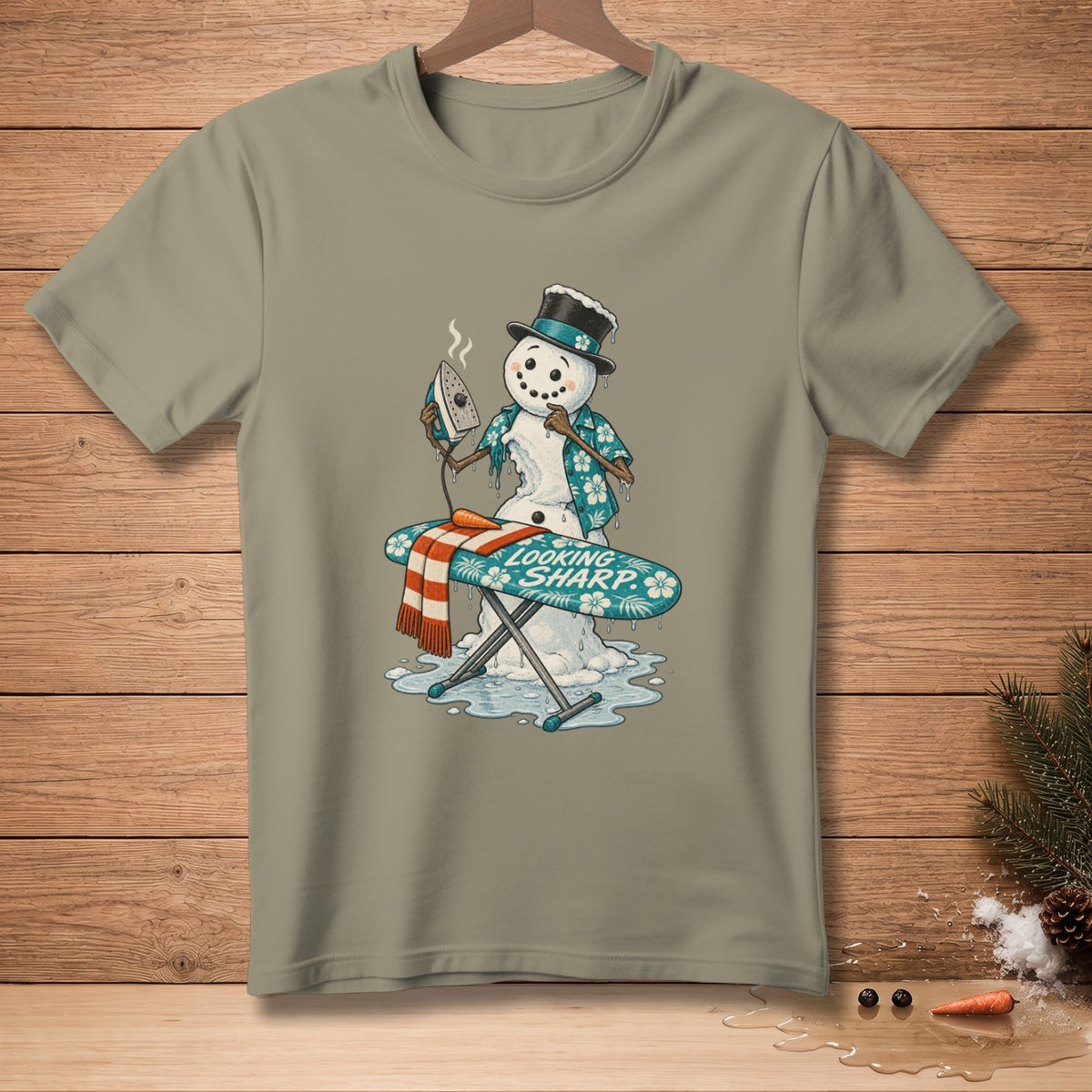 Snowman ironing a shirt on an ironing board with text "LOOKING SHARP".