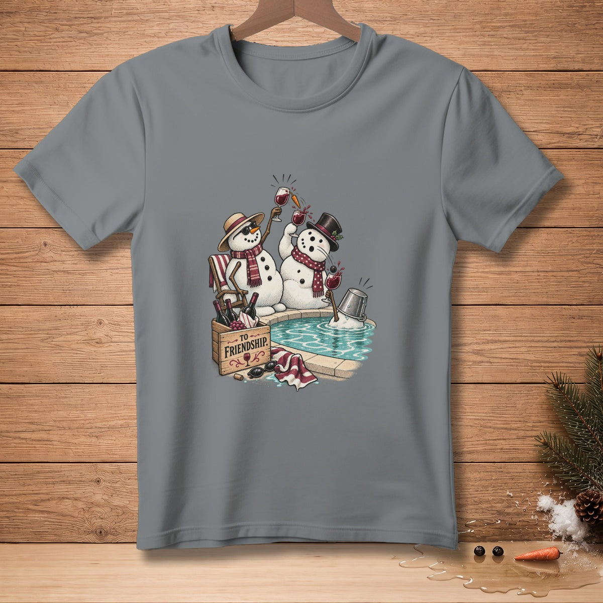 Two snowmen enjoy wine in a hot tub next to a wooden box labeled "To Friendship."