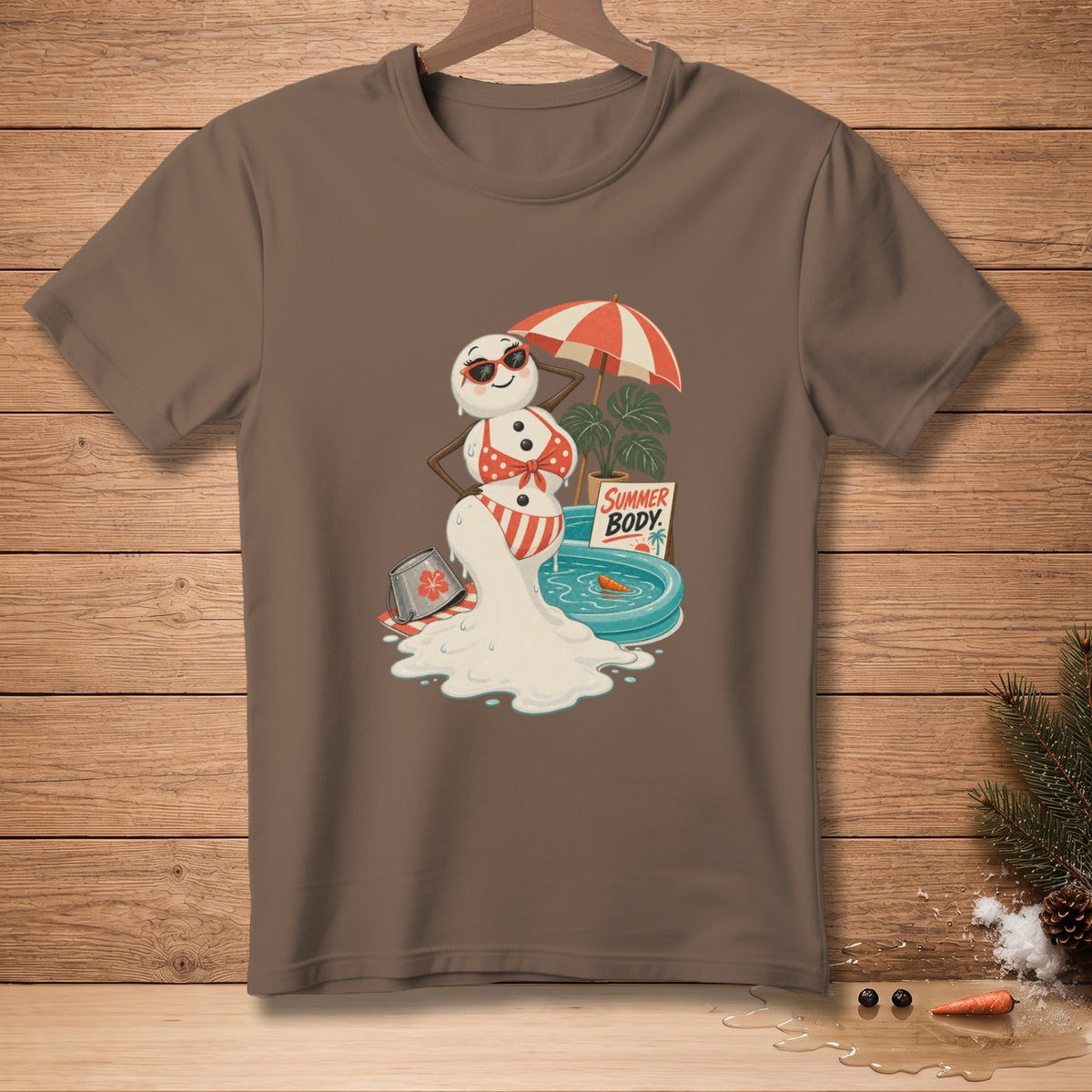 Snowman melting in a kiddie pool, wearing a bikini and sunglasses, with umbrella and text "SUMMER BODY".
