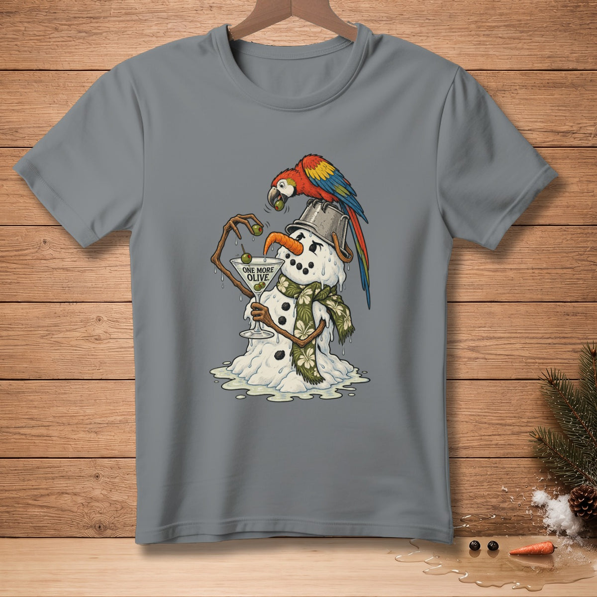 T-shirt with melting snowman holding martini with parrot on bucket hat, text "ONE MORE OLIVE".