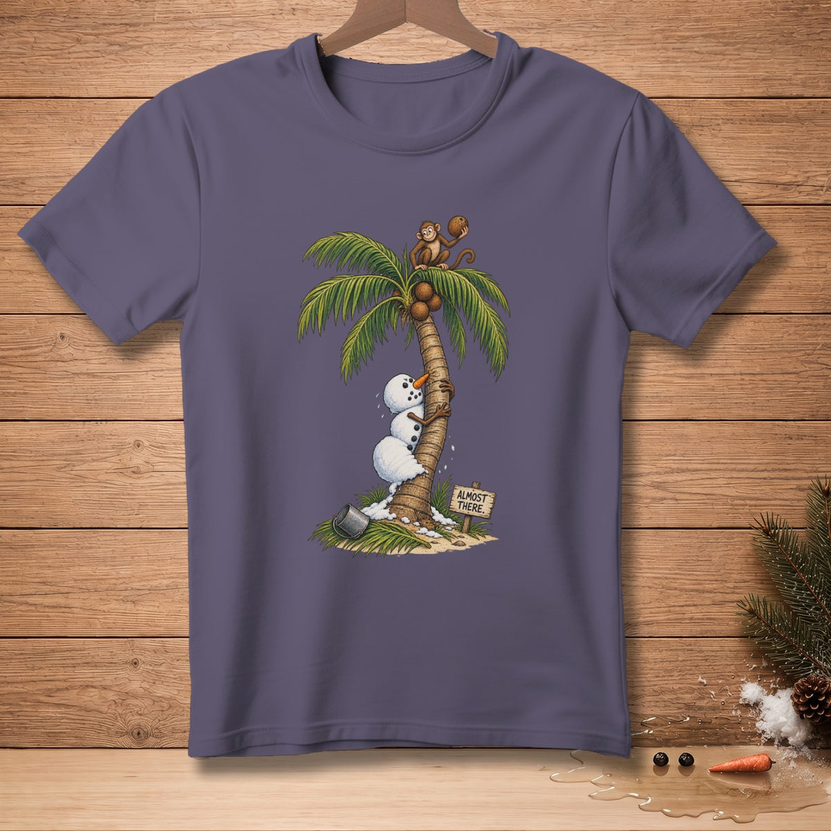 Snowman climbing palm tree with monkeys, sign reads "Almost There."