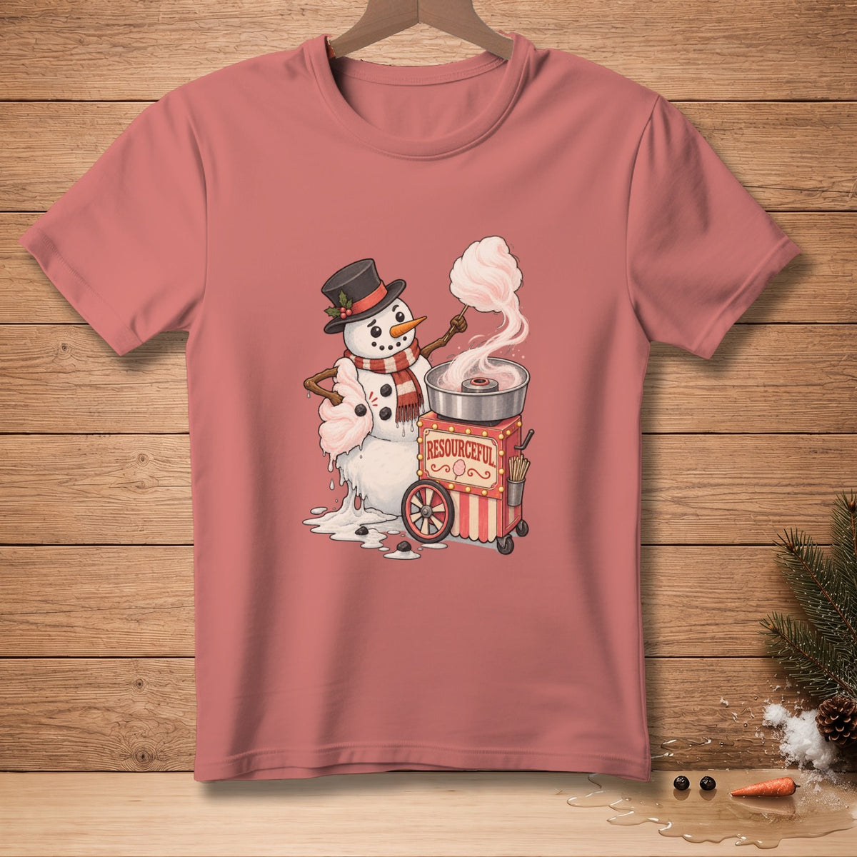 Snowman making cotton candy on a machine with "Resourceful" text on a rose t-shirt.