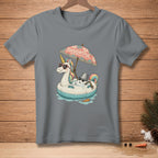 Unicorn on inflatable tube under umbrella with text "THOUGHTFUL" and melting snowman.