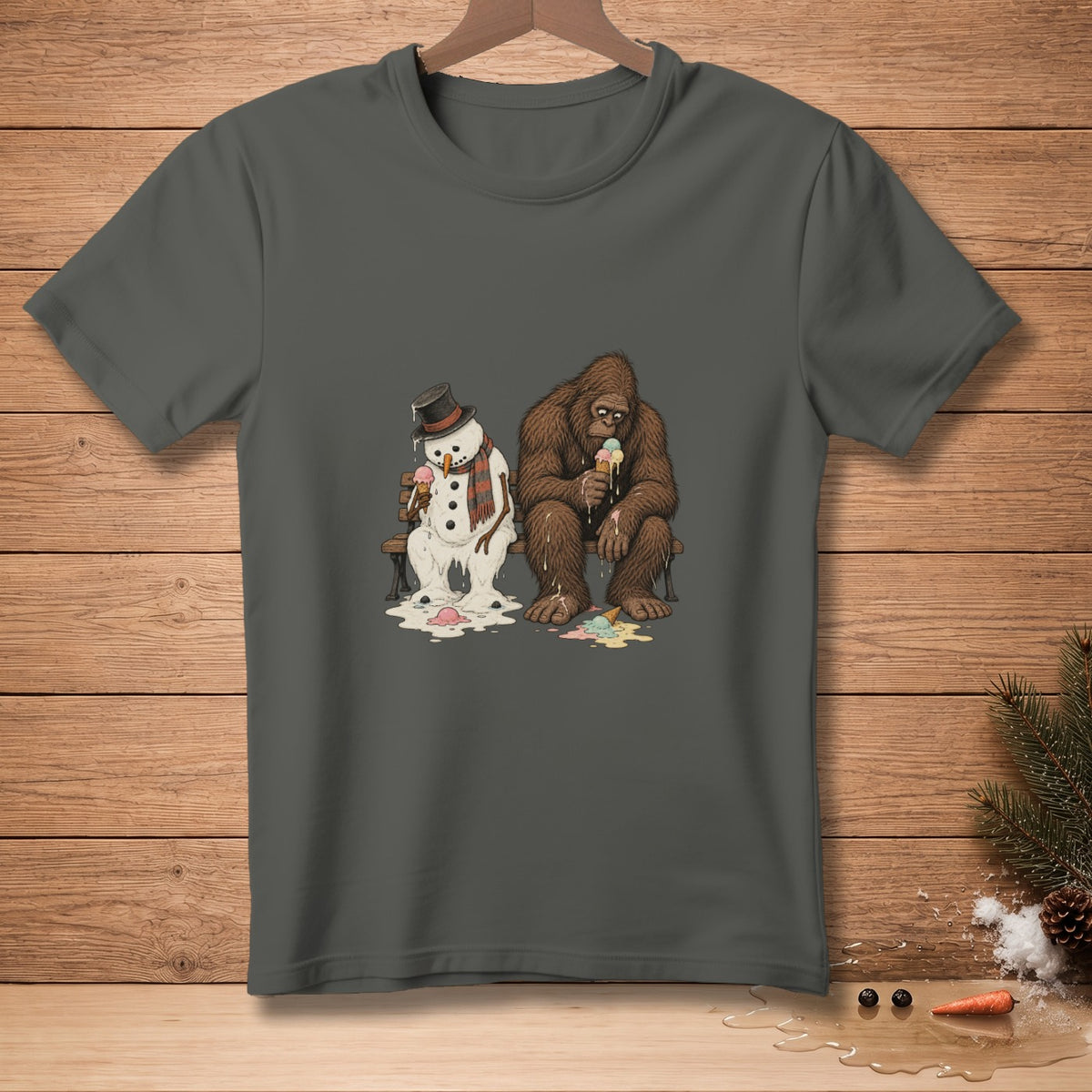 Melting snowman and Bigfoot sit on a bench eating ice cream cones.