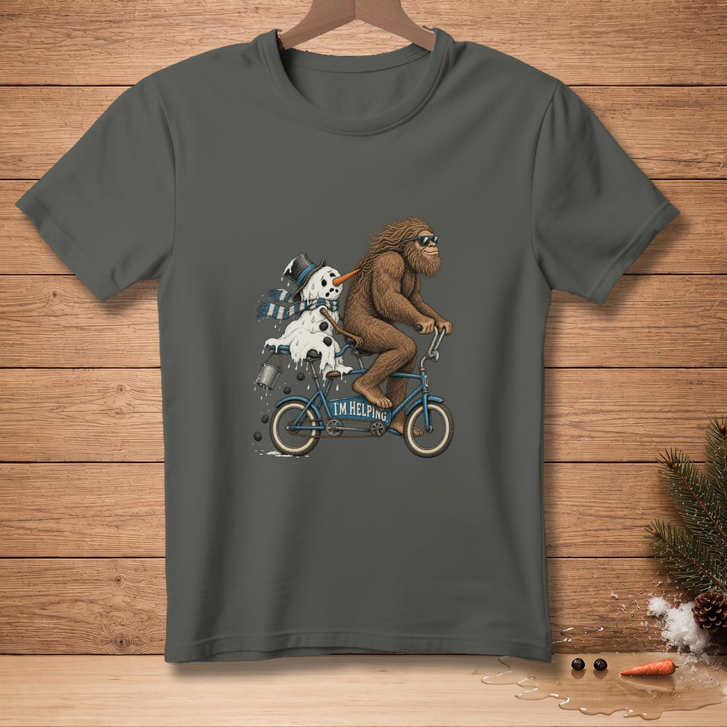 Bigfoot rides a bicycle with a melting snowman and text "I'M HELPING".