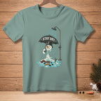 Melting snowman holding umbrella under shower, with "Stay Dry" text.