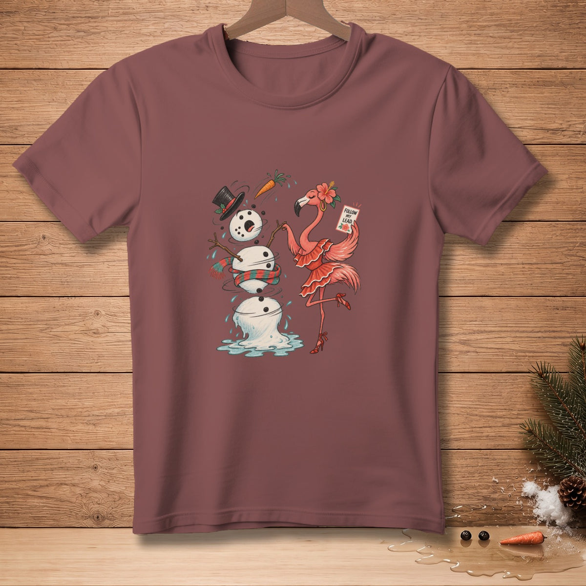 Flamingo holding "Follow My Lead" sign next to melting snowman with hat and scarf.