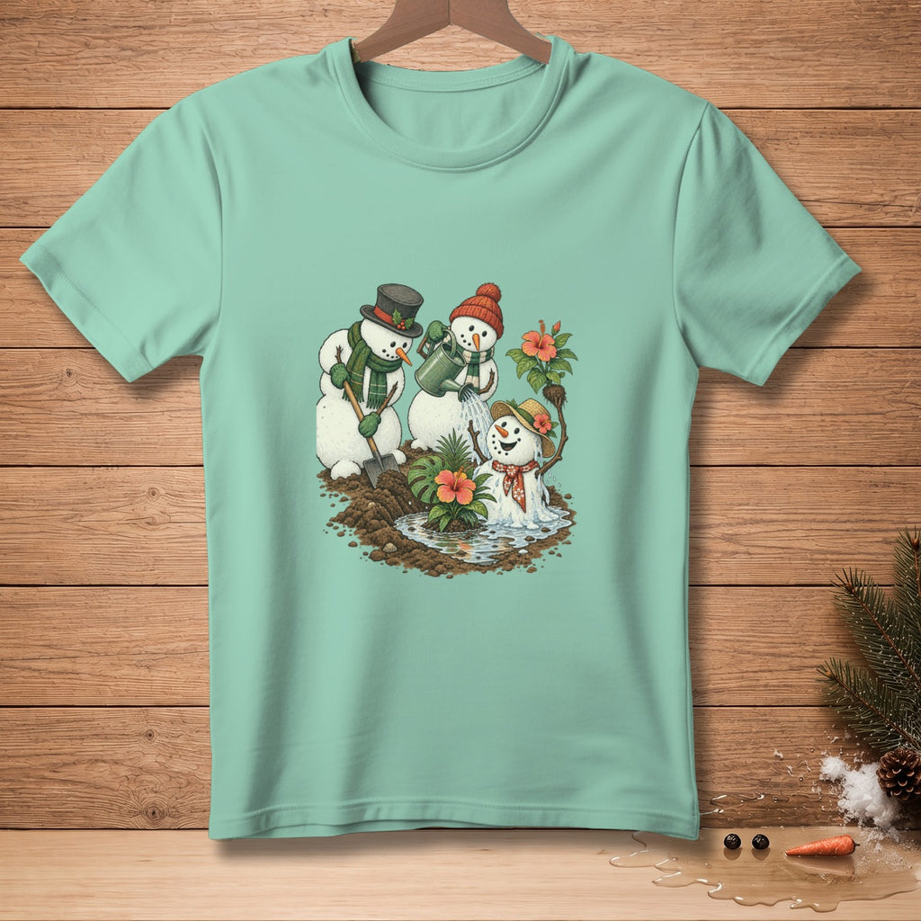 Snowmen gardening with flowers and watering can on a light teal t-shirt.