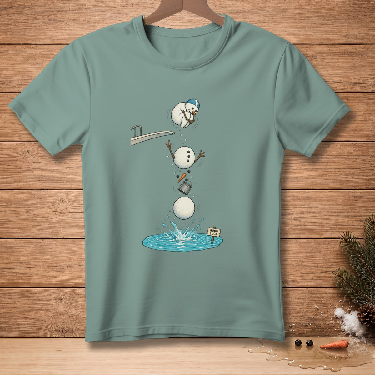 Snowman falling off diving board into water with "Good Luck" sign.