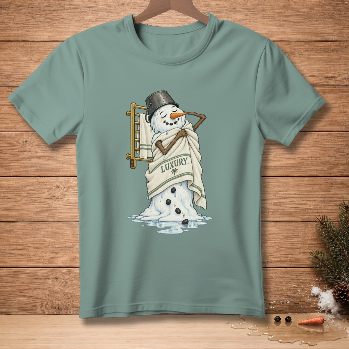 Snowman wrapped in a towel with the word LUXURY printed on it.