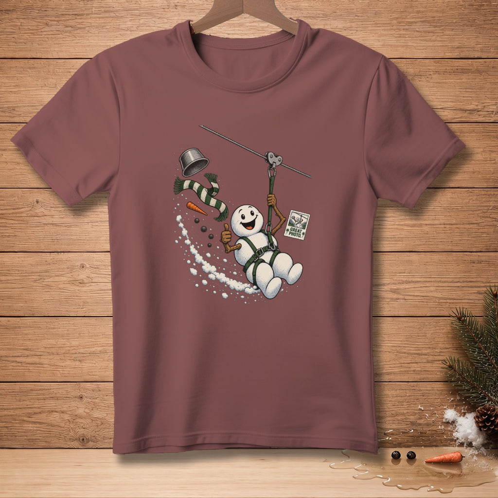 Snowman ziplining with a "Great Photo!" stamp and carrot nose.