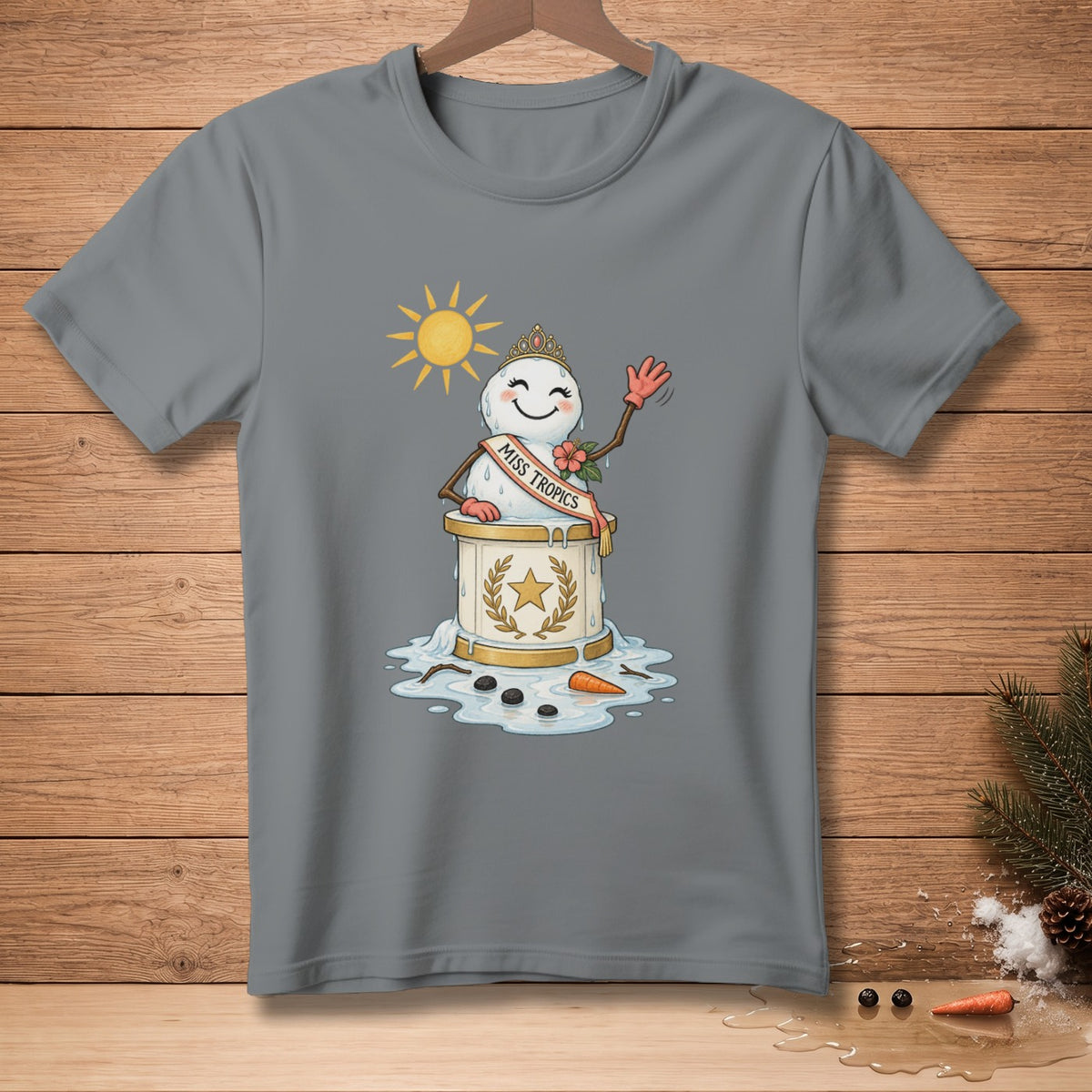 Melting snowman wearing crown and sash reads "MISS TROPICS" under a sun.