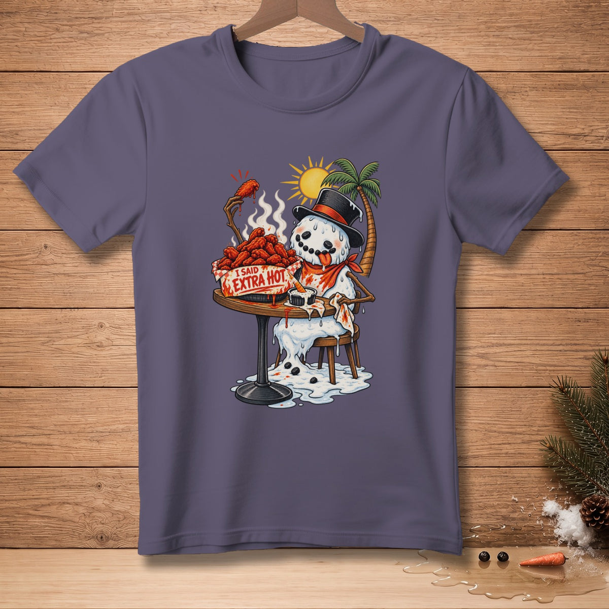 Melting snowman eating spicy chicken wings with "I Said Extra Hot" text.