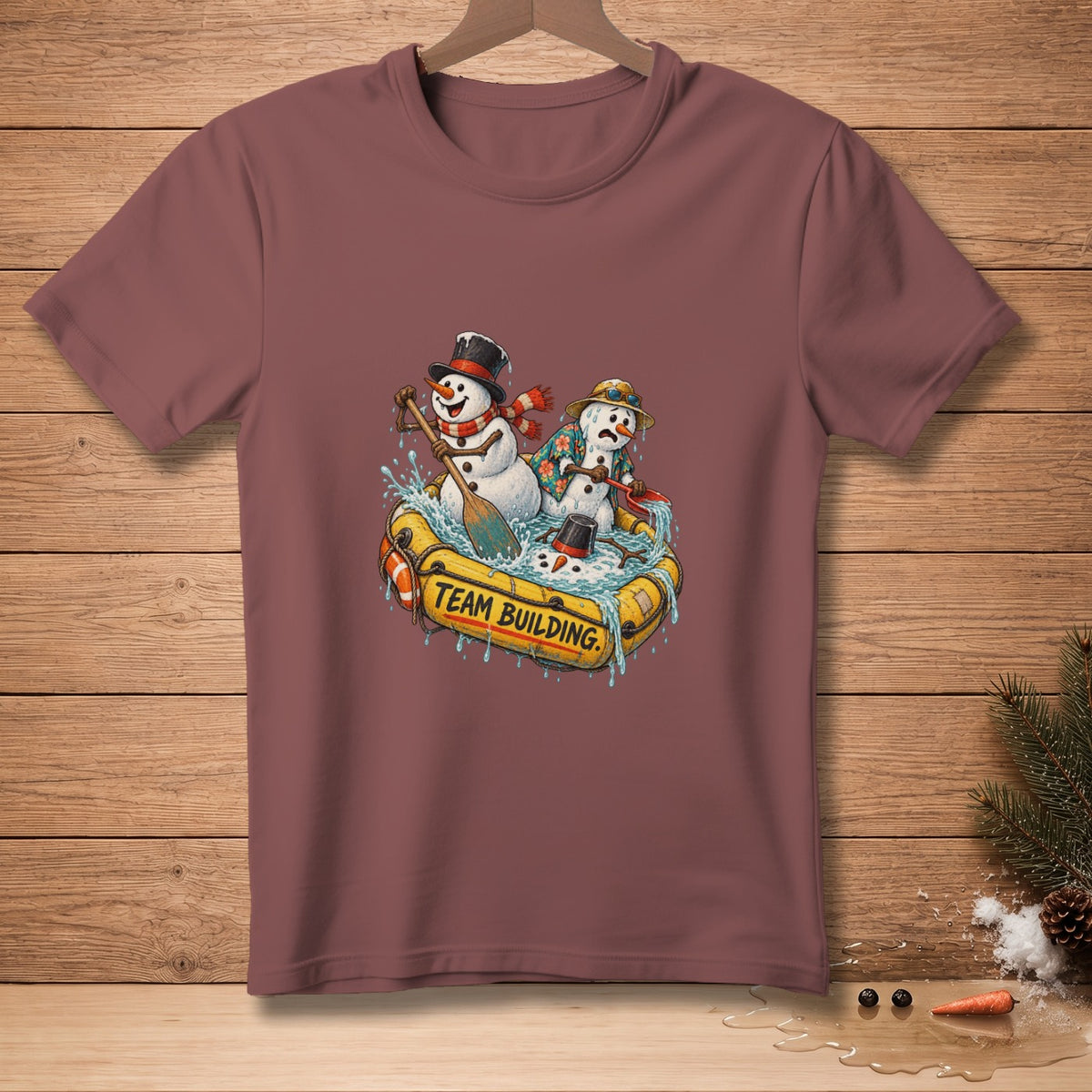 Snowmen in a raft with the words "TEAM BUILDING" and a paddle.